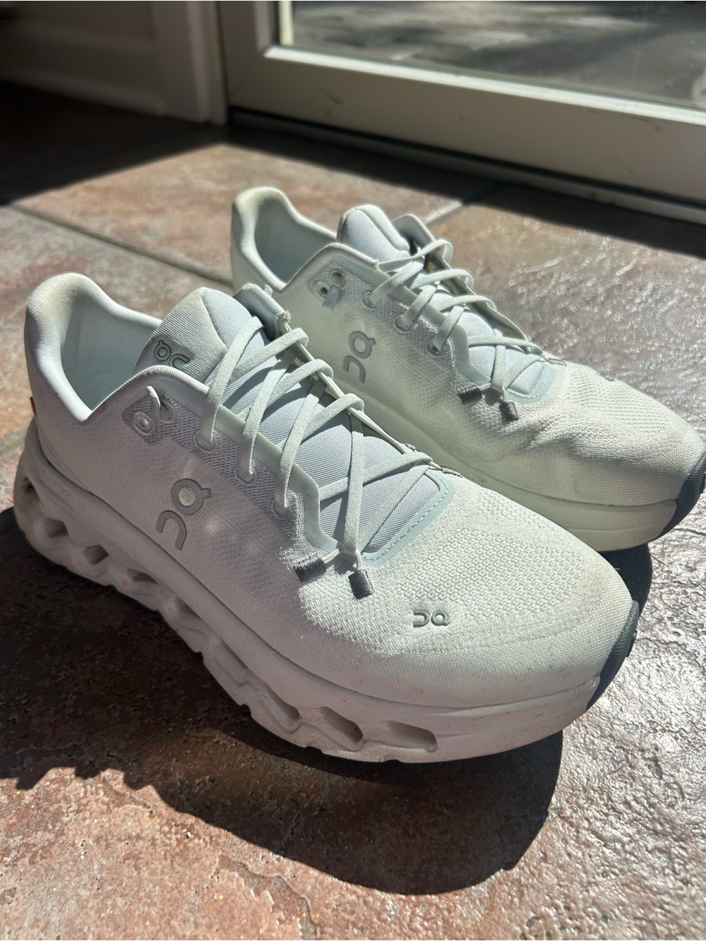 On Running Women’s Athletic Shoes in Off-White